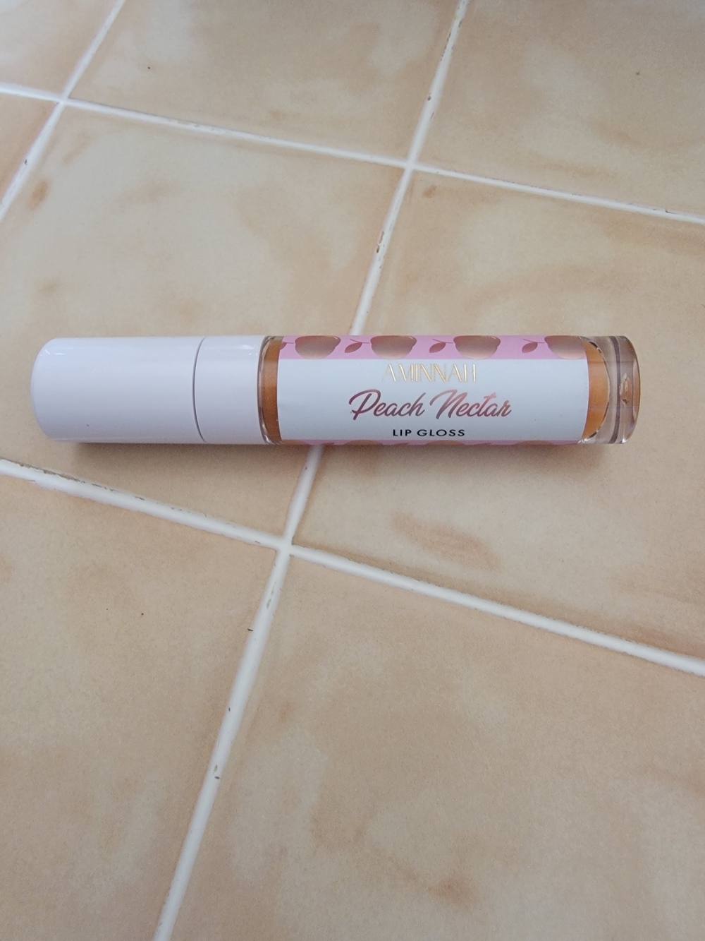 Aminnah Peach Nectar Lip Gloss.